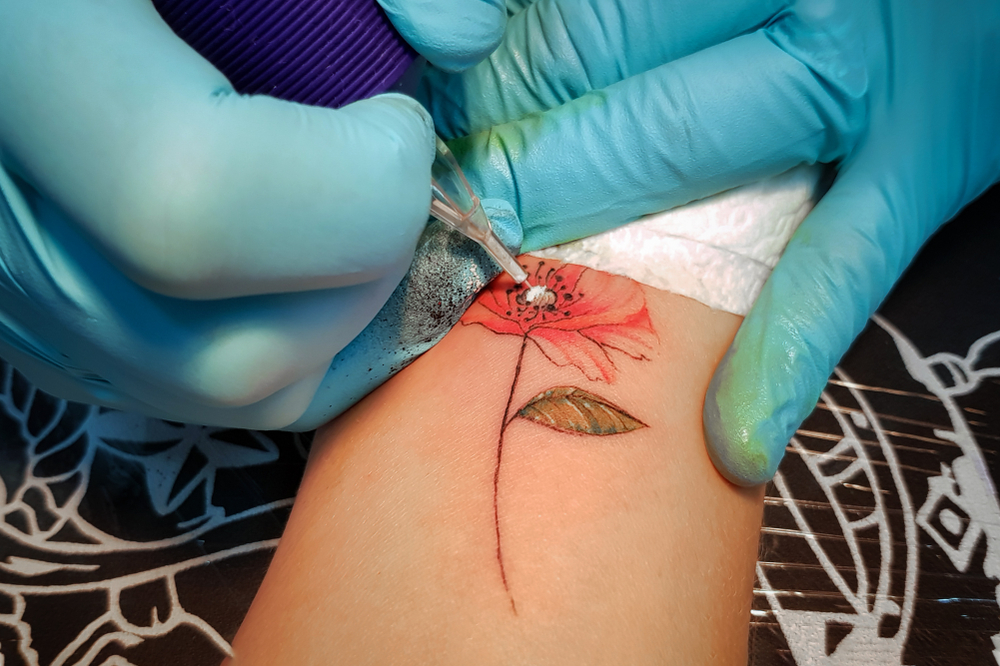 Mand gemte hemmelighed bag sin tatovering: Det kostede ham sit ægteskab